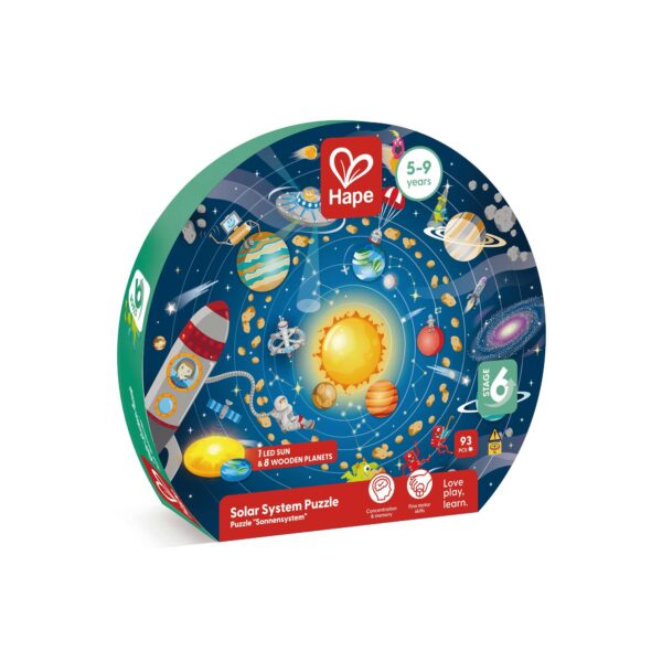 Hape ‘Solar System Puzzle’ for ages 5–9, featuring a colorful circular illustration of the Sun, planets, astronauts, rockets, and satellites. The packaging notes that the 93‑piece set includes an LED Sun and eight wooden planets, and highlights benefits such as concentration, memory, and fine motor skill development
