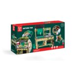 A boxed Hape ‘Nature Fun Outdoor Kitchen’ playset for ages 4–10, showing a wooden outdoor kitchen with a green sink, faucet, metal bowls, and storage shelves. The packaging features photos of children playing with the set, notes that it includes 15 pieces, and highlights its outdoor, eco‑friendly, imaginative‑play design.